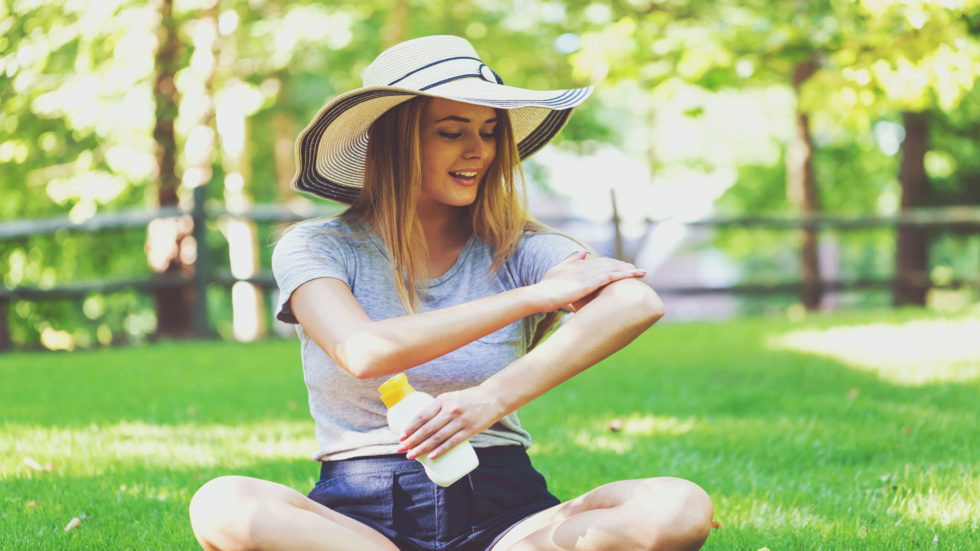 Girl Applying Sun Cream