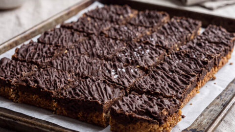 Tray of brownie flapjack squares, freshly baked and cut